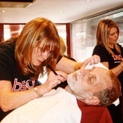 A traditional cut throat shave at The Barber Shop Group